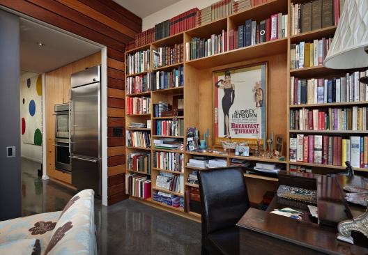 Wood cladding makes the adjacent skylit living area feel like an outdoor space.