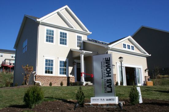 Aside from the signage and a small solar array, the IBACOS Energy Efficiency Lab Home resembles the rest of the units in the Cobblestone Estates community.