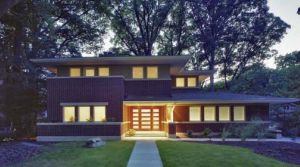 Built on a teardown lot in an old growth neighborhood, this handsome, 3,800-square-foot Prairie-style home maintains a low profile. Architect: GTM Architects Builder: Ebner Construction General contractor: homeowners