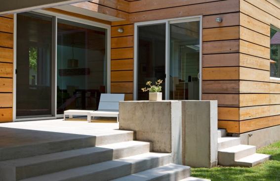 The kitchen's location provides easy access to the backyard terrace.