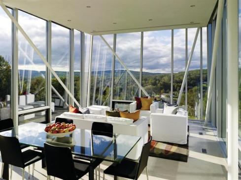 Views of the bucolic Berkshire mountain range permeate the homes interiors. 