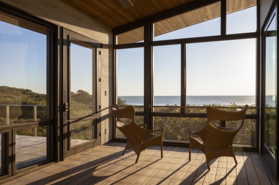 At+the+end+of+the+main+living+space+is+a+screen+porch+that+provides+a+shady+respite+throughout+the+day.+