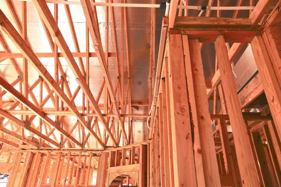 Nailers at the edge of ceilings (above) don't allow drywall installers to hold fasteners back from the corner. Instead, install blocking as shown below.