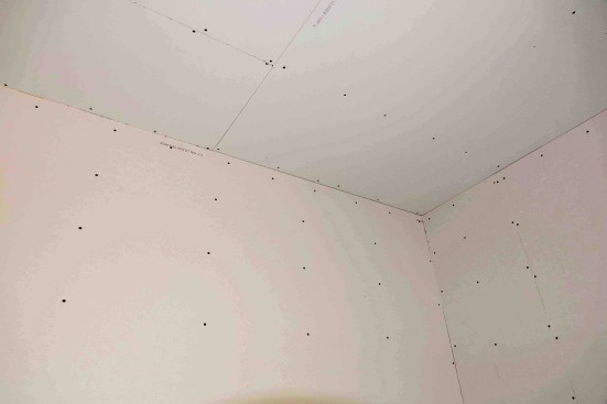 Fasteners placed tight into wall and ceiling corners may cause cracking in the corner. Instead, hold fasteners back to allow the corners to float.