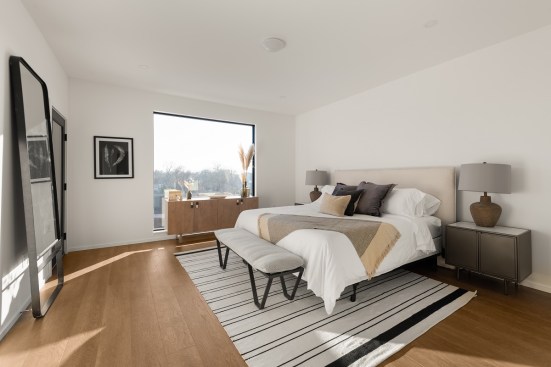 Large windows from the Pella Architect Series provide copious amounts of natural light in several rooms.