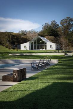 A white roof with light-colored hardscape help reduce local heat island effects while 50 percent permeable paving mitigates storm water runoff. 