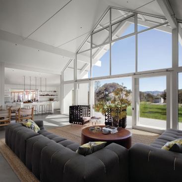 A wall of sliding glass doors adds natural ventilation to the long list of sustainable design features. 