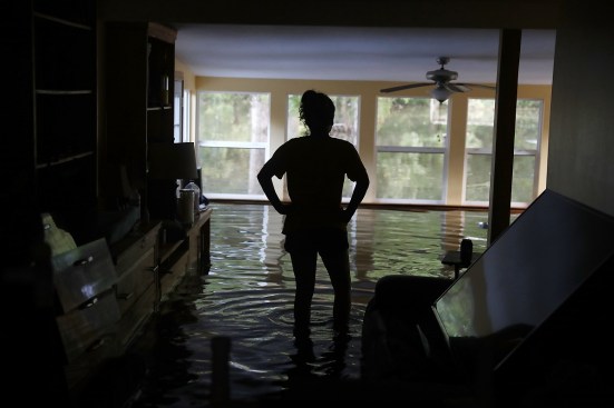 Three weeks after the flood, many residents were unsure how they would rebuild.