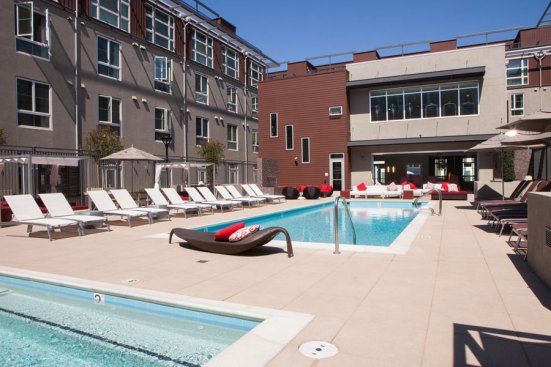 Domain Apartments' 485 modular units include high-end upgrades such as 9-foot ceilings, granite countertops, stainless steel appliances, and washers and dryers.