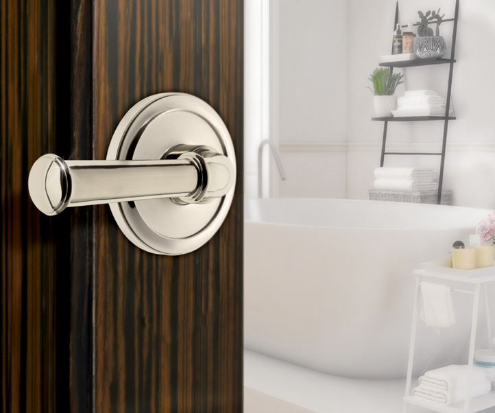 The Georgetown Lever by Grandeur Hardware with a Circulaire Rosette in Polished Nickel.