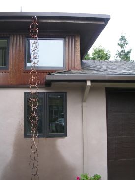 1x8 fir planks salvaged from the garage were reused as backing for the Corten steel siding, which is manufactured with up to 70% recycled content.