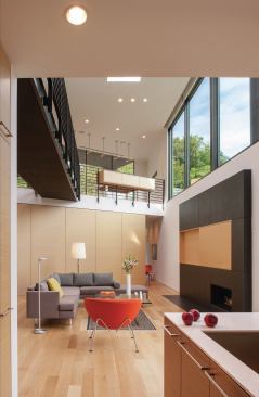 Balancing privacy with daylighting required the strategic placement of windows on the house’s long street-front elevation.