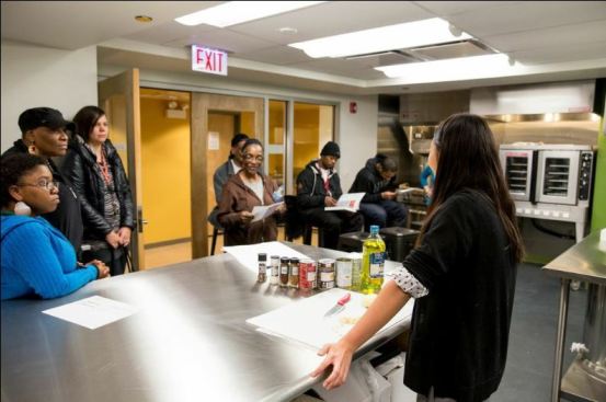 One of Heartland Housing’s social services partners gives cooking classes.