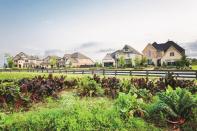 In Harvest Green by Johnson Development Corp., select houses overlook the community farm, while others sit adjacent to edible landscaping.