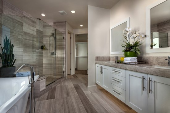 Interiors feature high-quality hard surfaces such as tiled baths.