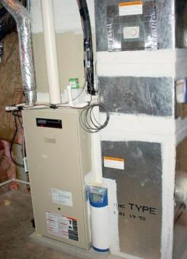 A high-efficiency furnace that's not too big or too small helps regulate indoor humidity levels. (Photo: DOE)