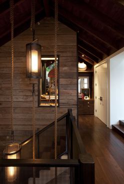 Rather than discard scaffolding deemed unusable per new OSHA standards, designer Erin Martin repurposed them for the stairway walls.