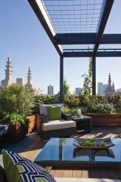 Planter boxes help to create a cozy entertaining niche.