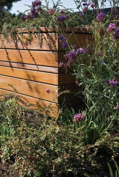 The planter boxes are hollow at the bottom, reducing the weight and allowing irrigation-line access through a hole in the back.