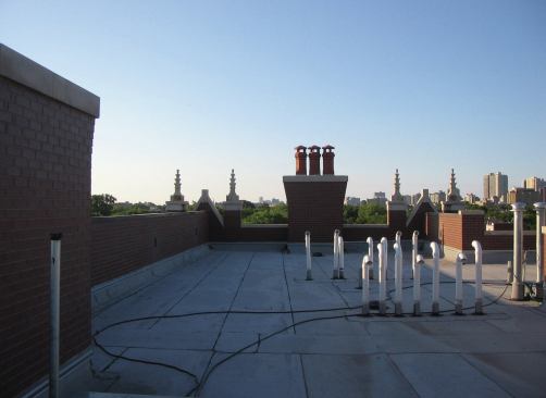 The vent stacks could not be moved, so they were painted black.
