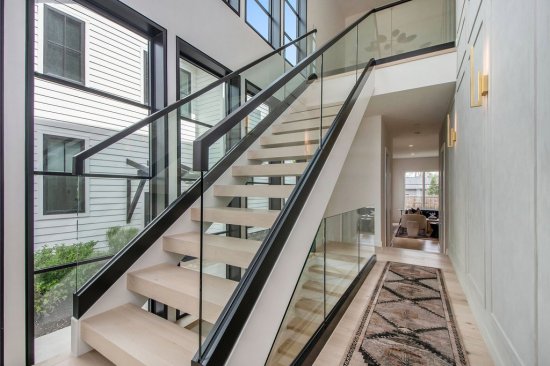 Urban infill house plan, foyer. See details at Houseplans. Next Door Photography, courtesy of Visbeen Architects.