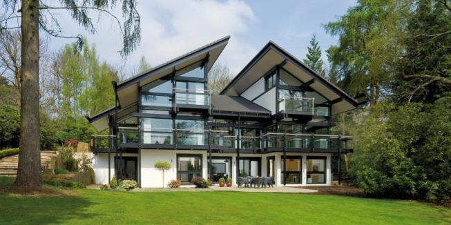 The factory-built Huf House features post-and-beam architectural design and energy efficient technology.