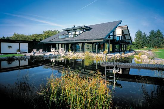 POWERING UP. House designs include the installation of roof-mounted solar panels.