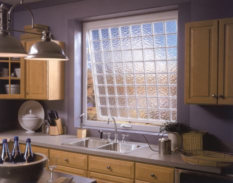 Hy-Lite.  Design Series acrylic block windows meet safety codes while letting in light without a view of the window well. Designed to meet the IBC of 5.7 feet for egress, the vinyl-framed window will work in a bedroom or bathroom, not just a basement, says the firm. The easy-to-open windows let in air and are energy efficient, durable, lightweight, and come in a selection of styles and sizes. 888.256.2599. 
www.hy-lite.com. –E.R.