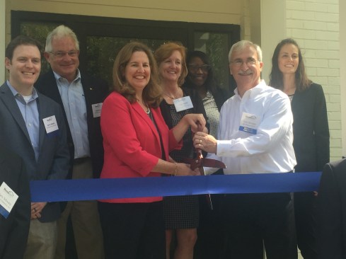A ribbon cutting ceremony was held on Sept. 19. From left were Jack Gallagher (Richmond American Homes), Chip Devine (Brookfield Residential), Mayor Allison Silberberg, Anne Lafond (Community Lodgings), Lynn Thomas (Community Lodgings), Jerry Berman (M/I Homes), and Kristyn Burr (HomeAid Northern Virginia).