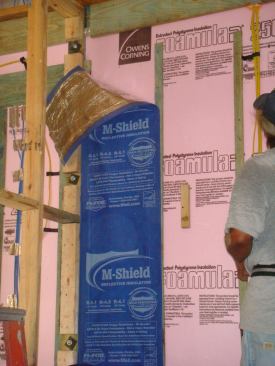 The house is tightly wrapped in several layers of insulation, including Owens Corning Foamular rigid foam and Fi-Foil’s M-Shield.