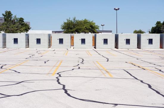 Defensive Line At the temporary high school in a repurposed mall building near Joplinâs Ridgeline Drive, a set of tornado shelters stand shoulder to shoulder, ready for the next storm. Had school been in session at the old high school on May 22, 2011, much of the student body might have perished.
