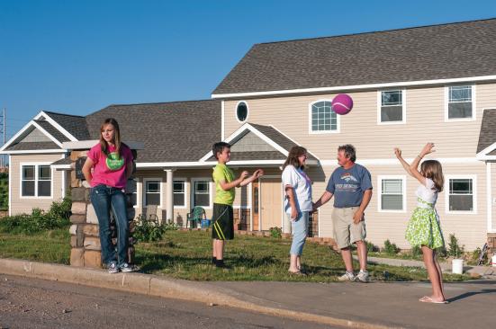 Home at Last The Huddleston family at their newly completed house (left to right: Emily, Michael, Dianne, Kenny, and Maggie).