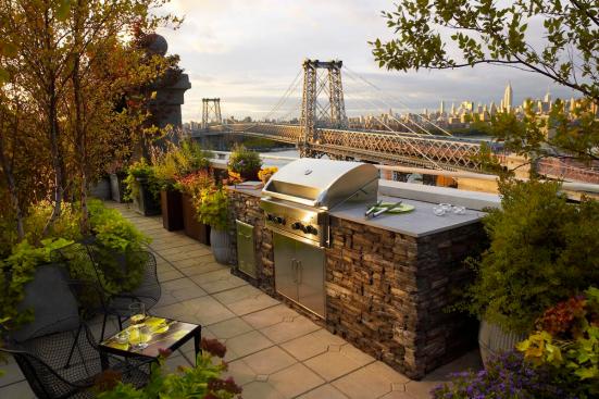 Metropolitan Signature Kitchen from Kindred Outdoors + Surrounds, faced with Eldorado Stone