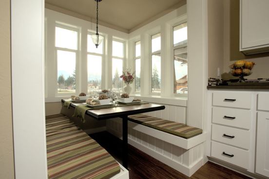 A nook helps optimize the use of space and provides a cozy spot for eating or working.