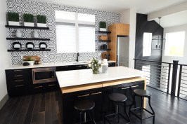 The second floor suite has a kitchenette for the flexibility to have separate living quarters for a renter, a caregiver, or an adult child.