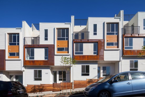 What looks like condos or townhouses are actually detached homes with fee simple ownership. A metal expansion joint conceals 8 inches of airspace between the homes.

