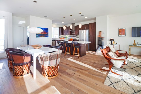 An open floor plan and entertaining-ready kitchen attracts young professionals.