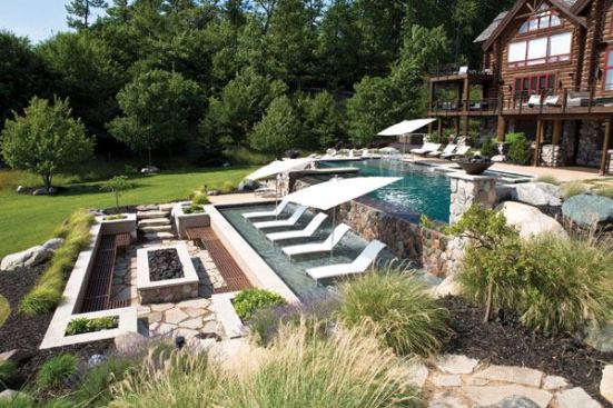 Two-Sided Story: This lake Michigan pool offers two unique and opposite views — a natural aesthetic when seen from the lake and a modern view when seen from the home.