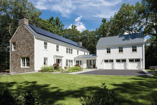 The building’s exterior combines traditional New England materials with a courtyard layout and stone gable walls inspired by Irish farmhouses.