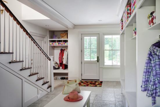 The link between the garage and the main wing comprises an informal entry with a private stair that serves the guest quarters above the garage.