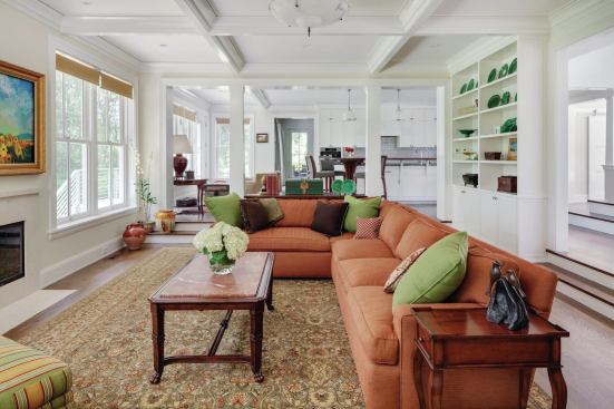 The first floor plan is essentially open, but with individual rooms articulated enough to give each a separate identity.