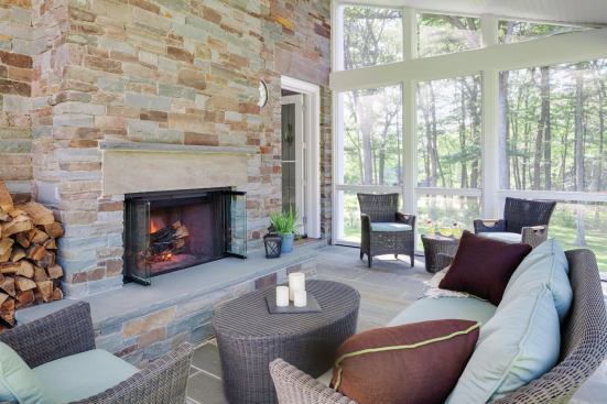 A screened porch--essential in this location--occupies an end of the main wing, where it casts no shade on interior spaces.