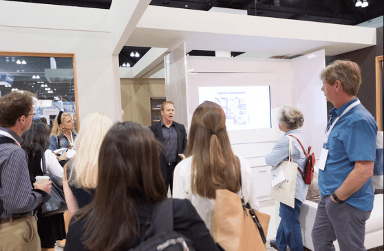 1,295 visitors toured the Greenbuild KB Home ProjeKt, learning here about "cartridge" and component construction techniques for a moveable wall for an adaptive floor plan. Credit: David England Photography