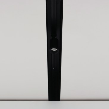 Cover integrates lighting tracks into the seams where two prefabricated panels fit together.