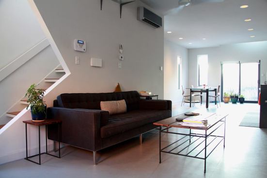 The architects at Interface Studio focused on creating an open feel in the Skinny's living areas to make the narrow footprint live large.