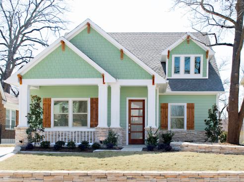 The 3,200-square foot house stands on a 50-by-150-foot lot and recalls the bungalow-style houses that came before it. But it’s a lot greener: May’s electric bill came to just $58. In the yard, drought-tolerant landscaping and drip irrigation helped nab LEED points.