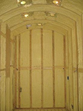 Hanan & Lerner Fine Woodworking removed the existing drywall and sprayed closed-cell polyurethane foam in the walls and ceiling to maintain the conditioned environment. The closed-cell foam serves as both insulation and a vapor barrier essential for a cold room. 
