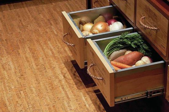 Hanan & Lerner Fine Woodworking fabricated drawers for root vegetables and cheeses using wine crates for fronts. They added metal drawer liners for easy cleaning and sisal rope handles for a unique touch. 