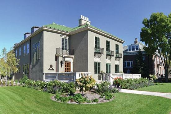 Aspects of the villa's facade include Ludowici (ludowici.com) clay tile, Haddonstone for the exterior cast stone, terra cotta medallions by Saint Paul Fabricating (stpaulfab.com), and Marvin Ultimate windows (marvin.com)