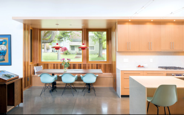 The kitchen of the Madison Passive House is open and bright, thanks to large windows and high ceilings.